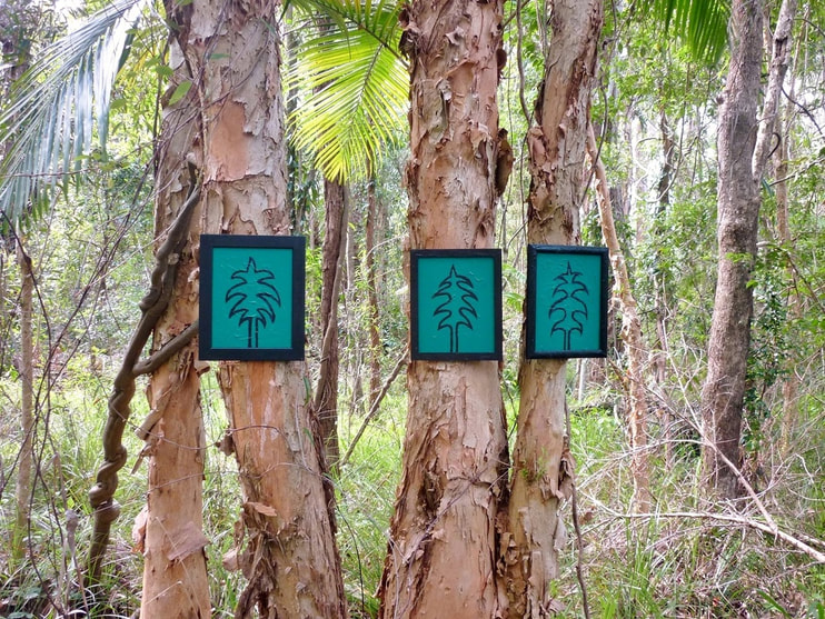 Gerry Joe Weise, Land Art. Turquoise Trees, mixed media with paperbark trees, Nambucca Valley State Forest, Australia, 2015.